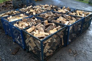 Logs in baskets ready for the kilns.